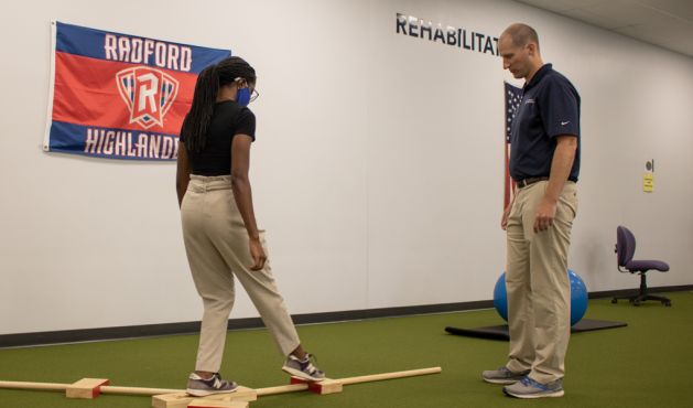 Professional Rehab Associates patient balancing during vestibular physical therapy session in Radford, Va