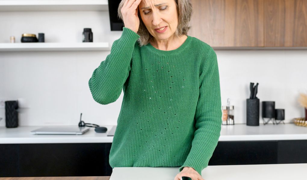 Woman at home in Radford Virginia experiencing migraine and needing neurological physical therapy services