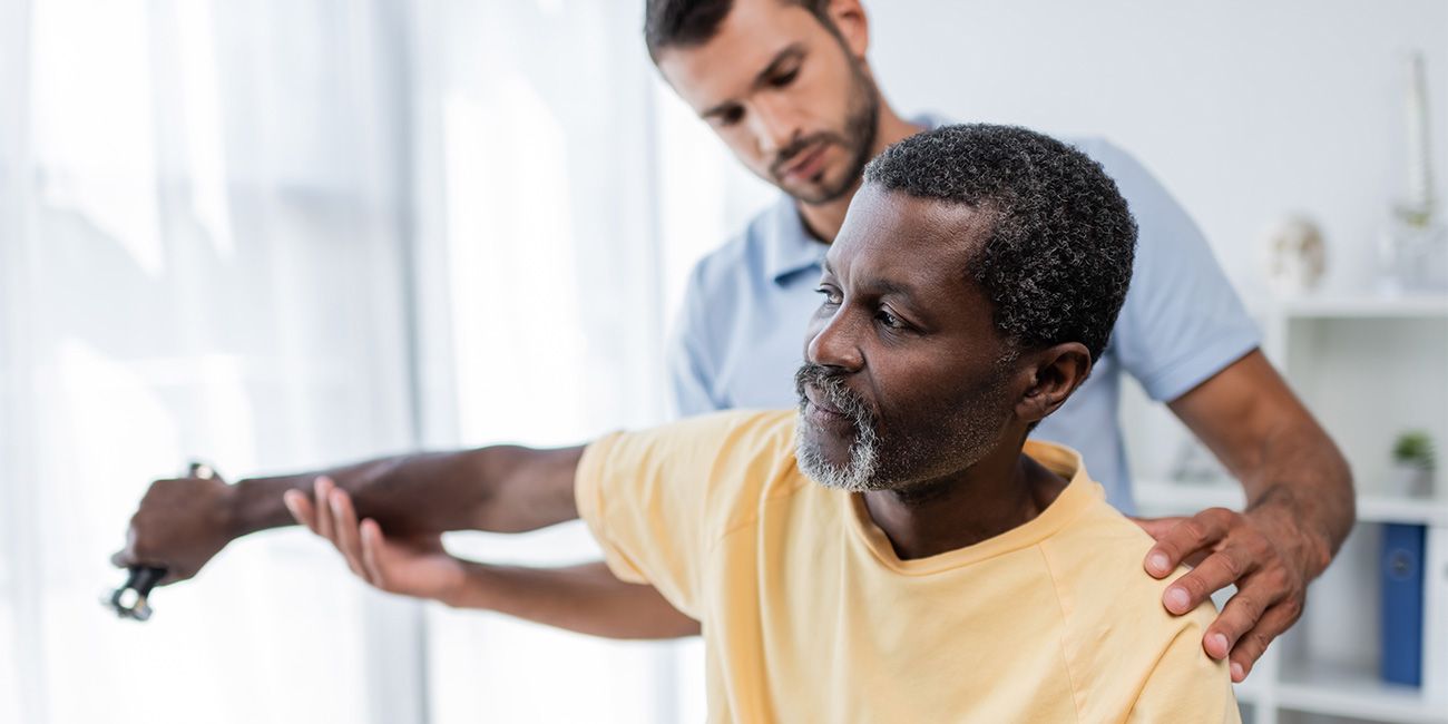 Professional Rehab Associates patient receiving active physical therapy assistance in New River Valley