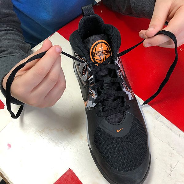 Pediatric Occupational therapy services in radford, virginia at Professional Rehab Associates helping child learn to tie shoe