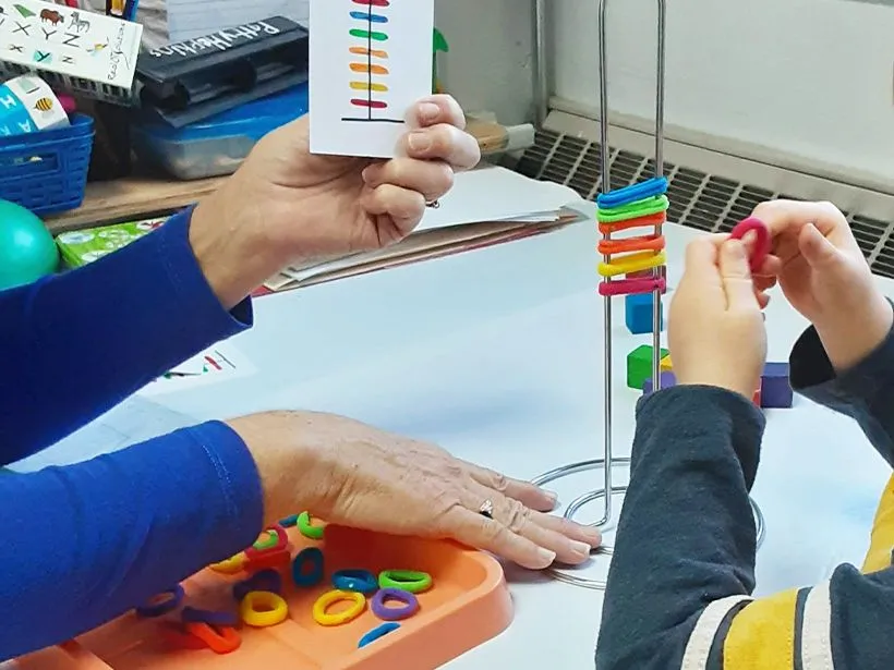 pediatric occupational therapy at professional rehab associates boy tying shoelaces